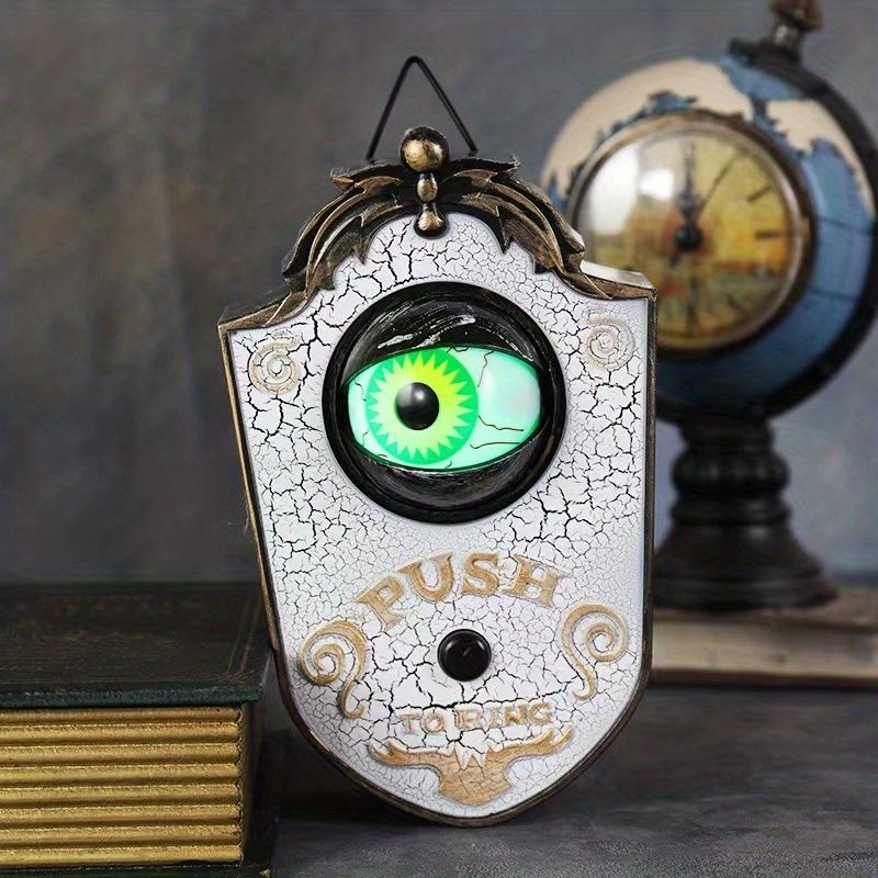 Ghost Doorbell Halloween Decoration with moving eyeball and eerie design for spooky Halloween fun.
